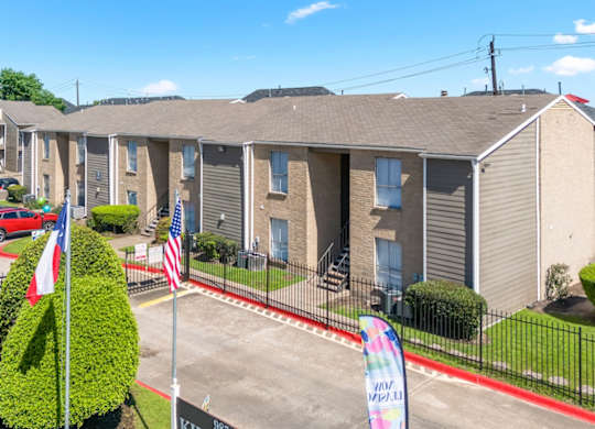 The gated entrance to Kirkwood Landing Apartments in Houston, TX 77099