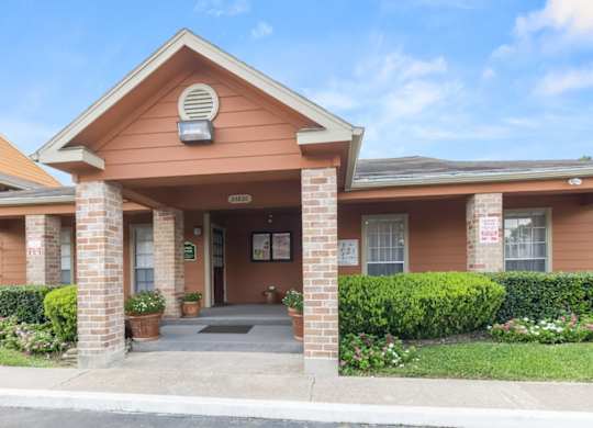 the front entrance of the leasing office at The Forest Apartments