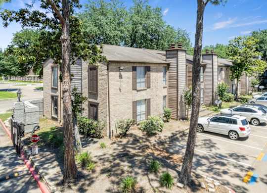 Ample parking in front of residential buildings at Hudson at Westchase Apartments