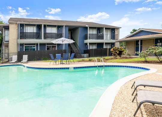 One of the two sparkling pools at Pine Creek Apartments in Houston, TX