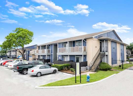 a row of apartment homes at Pine Creek Apartments for rent in Houston, TX