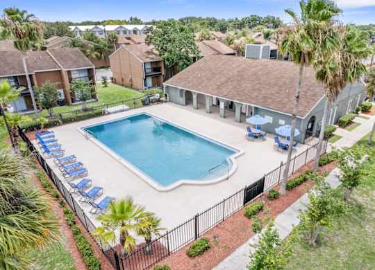 The clubhouse and pool at Winford Place Apartments for rent in Orlando, FL