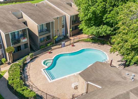 an aerial view of one of the two pools and sundecks at Kirkwood Landing