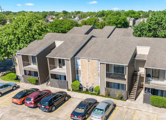 an aerial view of residential buildings at Kirkwood Landing Apartments in Houston
