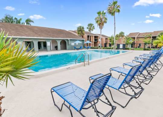 Residents at Winford Place enjoy a relaxing pool and sundeck with plenty of lounge chairs