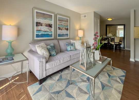 the model home with furnishings at Waters at Westchase Apartments in Houston
