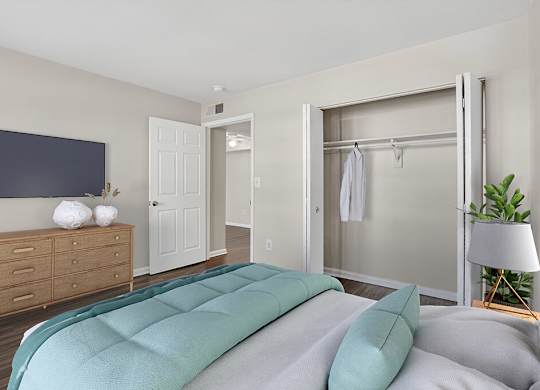 Bedroom and closet at Brentwood Apartments In Manassa VA