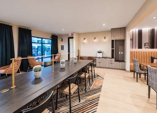 Social lounge dining area at 1900 Parmer Apartments in Austin TX