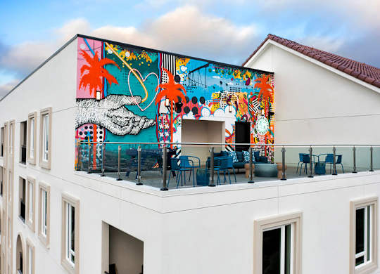 Aerial view of rooftop terrace at Chromatic Flats Apartments in San Diego CA