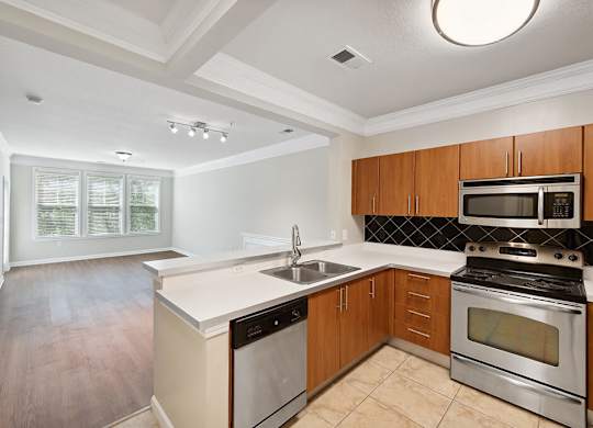 Kitchen with view of living room at Westerchester at the Pavillions in Waldorf MD