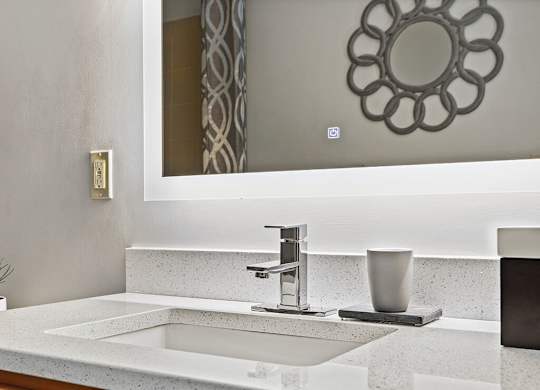 Bathroom vanity at Axis Admirals Hill Apartments in Chelsea MA