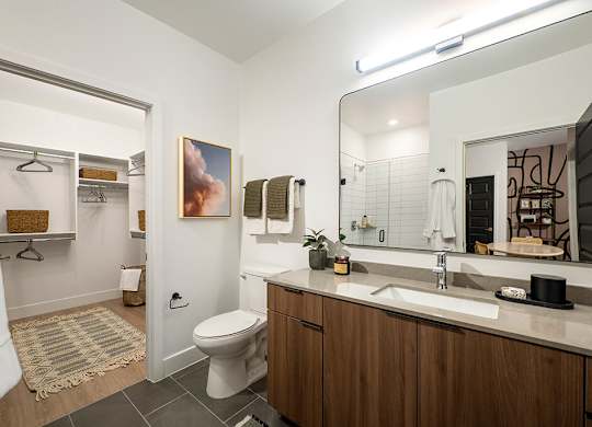 Bathroom with closet at 333 Ellington Apartments in Gaithersburg MD