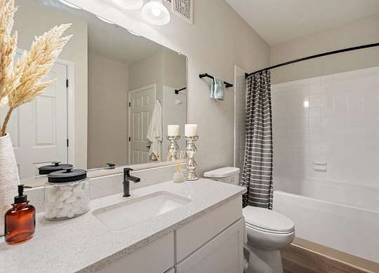 Bathroom with sink and shower at River Pointe at Den Rock Park in Lawrence MA