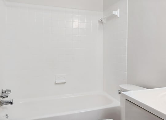 Bathroom with white vanity at Oakfield Apartment Homes in Wheaton MD