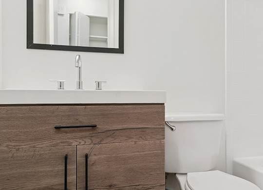 Bathroom with vanity at Oakfield Apartment Homes in Wheaton MD