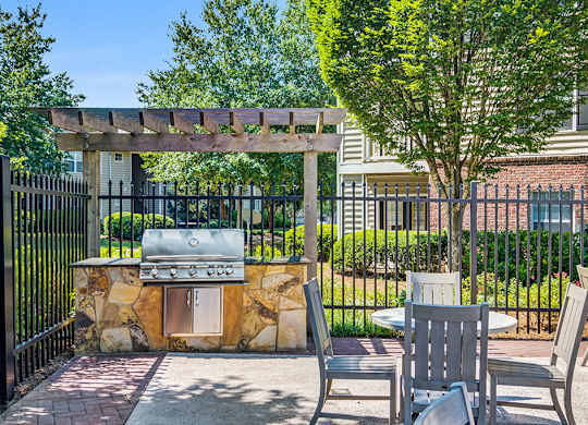 Barbecue area at Chroma Park Apartments in Austell GA