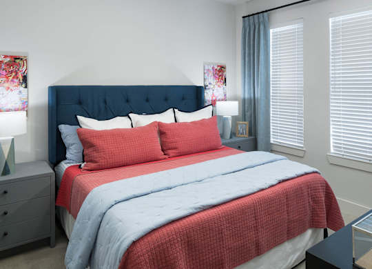 Bedroom with natural lighting at Jada Legacy Central Apartments in Plano TX