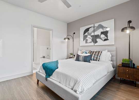 Bedroom with ceiling fan at VERO Apartments in Chelsea MA