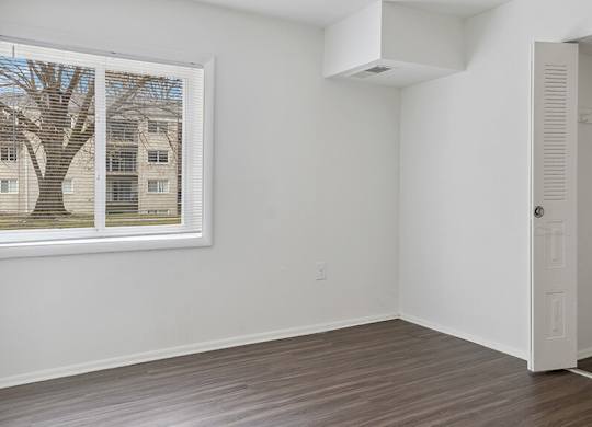 Bedroom and closet at Oakfield Apartment Homes in Wheaton MD