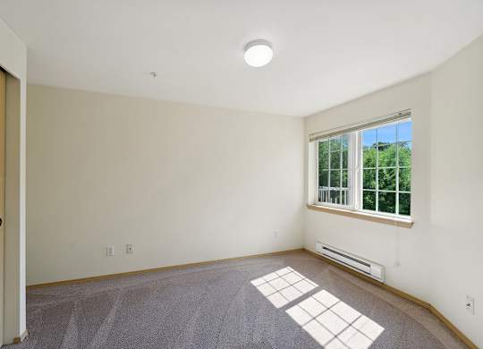 Bedroom at Woodlands at Forbes Lake Apartments in Kirkland WA