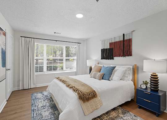 Bedroom with window at Chroma Park Apartments in Austell GA