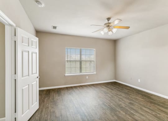 Bedroom with window at Sterling Green and Sheldon Ranch in Channelview TX