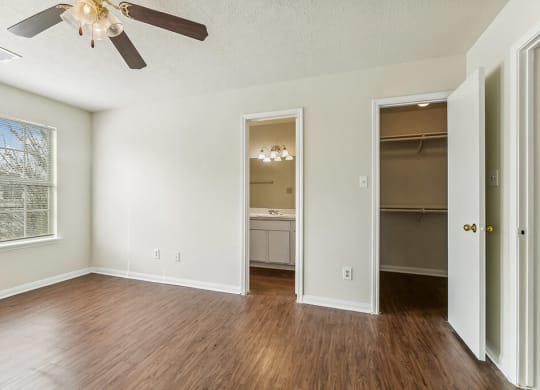 Bedroom with ceiling fan at Sterling Green and Sheldon Ranch in Channelview TX