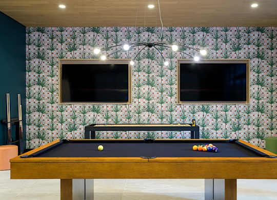 Pool table in game room at Coasterra Apartments in Fort Lauderdale FL
