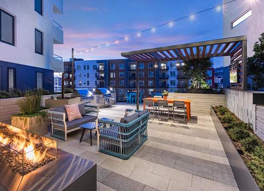 Couryard seating at dusk at Altitude Apartments in South San Francisco CA
