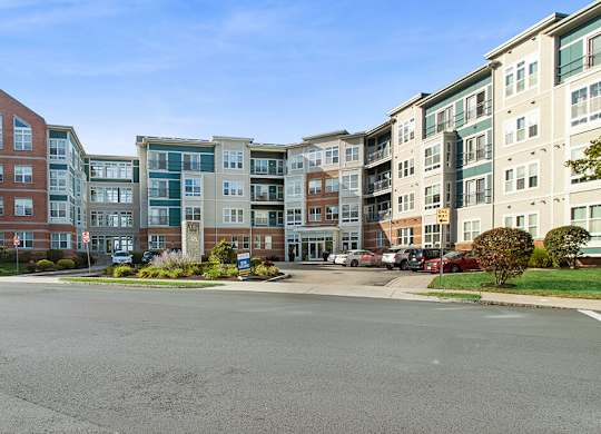 Building exterior at Axis Admiral Hill Apartments in Chelsea MA