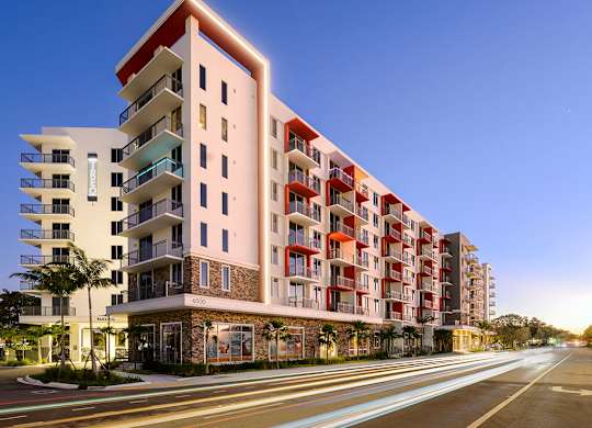 Exterior building at dusk at Treo Apartments in Fort Lauderdale FL
