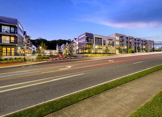 Building exterior at dusk Wayfern Apartments Sandy Springs GA