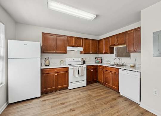 Kitchen with appliances at Riverwoods Apartments in Woodbridge VA