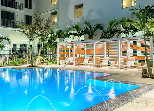 Cabanas at dusk at Treo Apartments in Fort Lauderdale FL