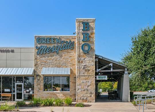 The Green Mesa Bistro is a restaurant with a stone facade and a covered patio.