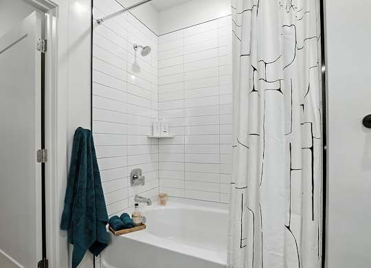 Charcoal design bathroom at Station 316 Woburn MA