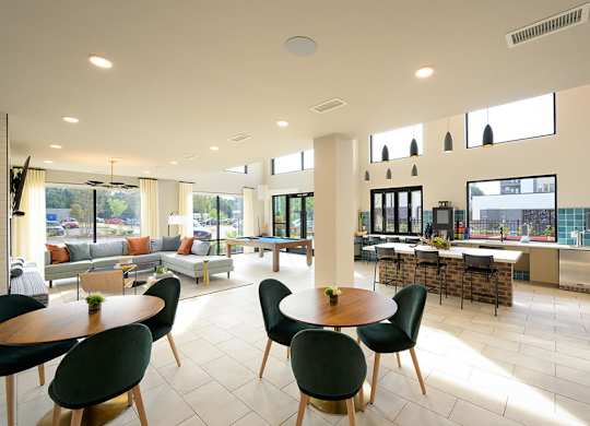 Club room seating area and billiards at Verge Apartments in Atlanta GA