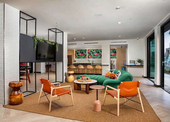 Clubroom Jive Seating Area and Kitchen at Chroma Apartment Homes in Canoga Park CA