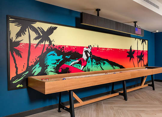 Clubroom Jive Shuffleboard Table at Chroma Apartment Homes in Canoga Park CA