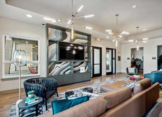 Clubroom TVs at The Quill Apartments in Milford, MA