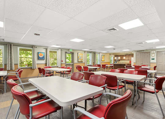 Community lounge and kitchen at Fairbrooke Senior Apartments in Aberdeen MD