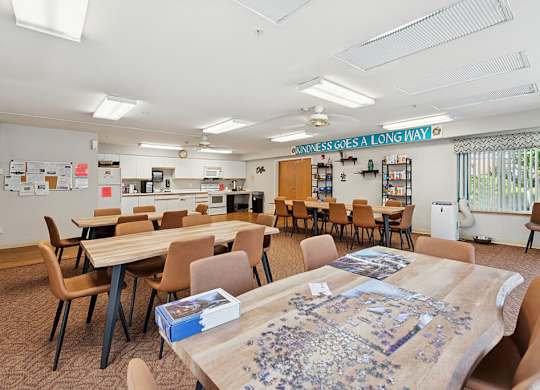 Community room seating area at Lakewood Meadows Apartments in Lakewood WA