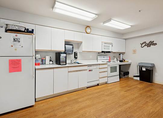 Community room kitchen at Lakewood Meadows Apartments in Lakewood WA