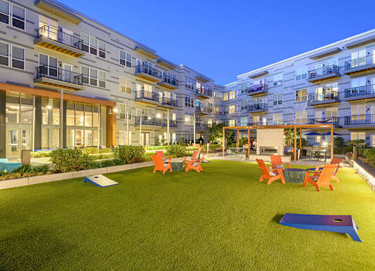 Cornhole and Lawn Chairs in Courtyard at Vero Apartments in Chelsea MA