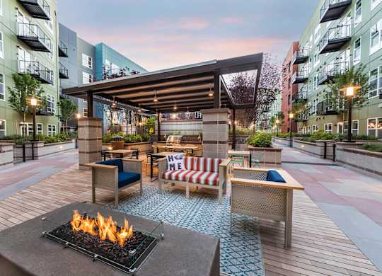Courtyard Fire Table at Dusk at North at Totem Lake Apartments in Kirkland WA