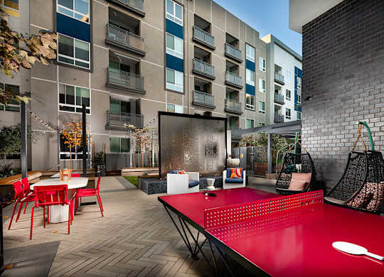 Courtyard Recess Ping Pong at Chroma Apartment Homes in Canoga Park CA