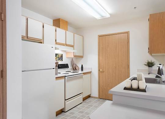 Kitchen with fridge at Boardwalk in Olympia WA