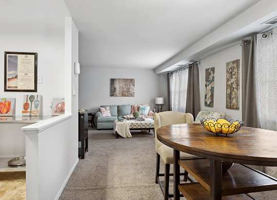 Dining room and living room at Villages at Marley Station in Glen Burnie MD