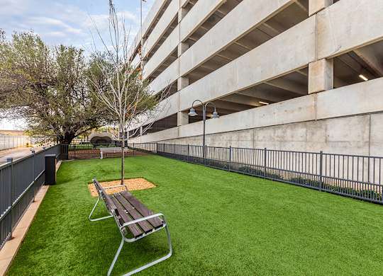 Dog park bench at Luca Apartments in Austin TX