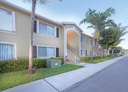 Exterior of apartments at Brenton at Abbey Park Apartments in West Palm Beach FL